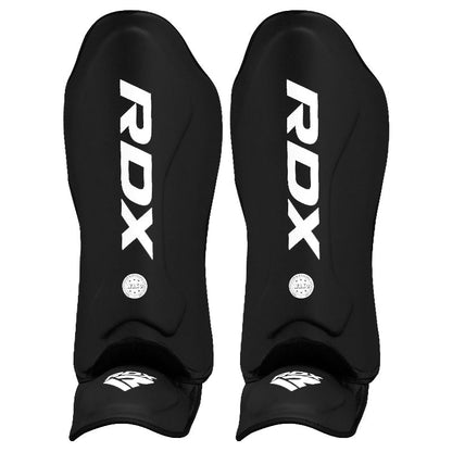 Protecciones RDX WAKO SHIN INSTEP T1 Black en color Negro, vista principal